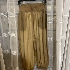 FP movement gold pants worn once for a few hours also in bronze